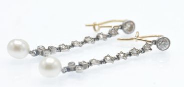 A Pair of Belle Éproque Diamond & Pearl Pendant Earrings