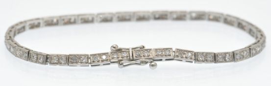 A Gold, Platinum & Diamond Line Bracelet