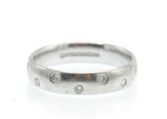 An 18ct White Gold & Diamond Band Ring