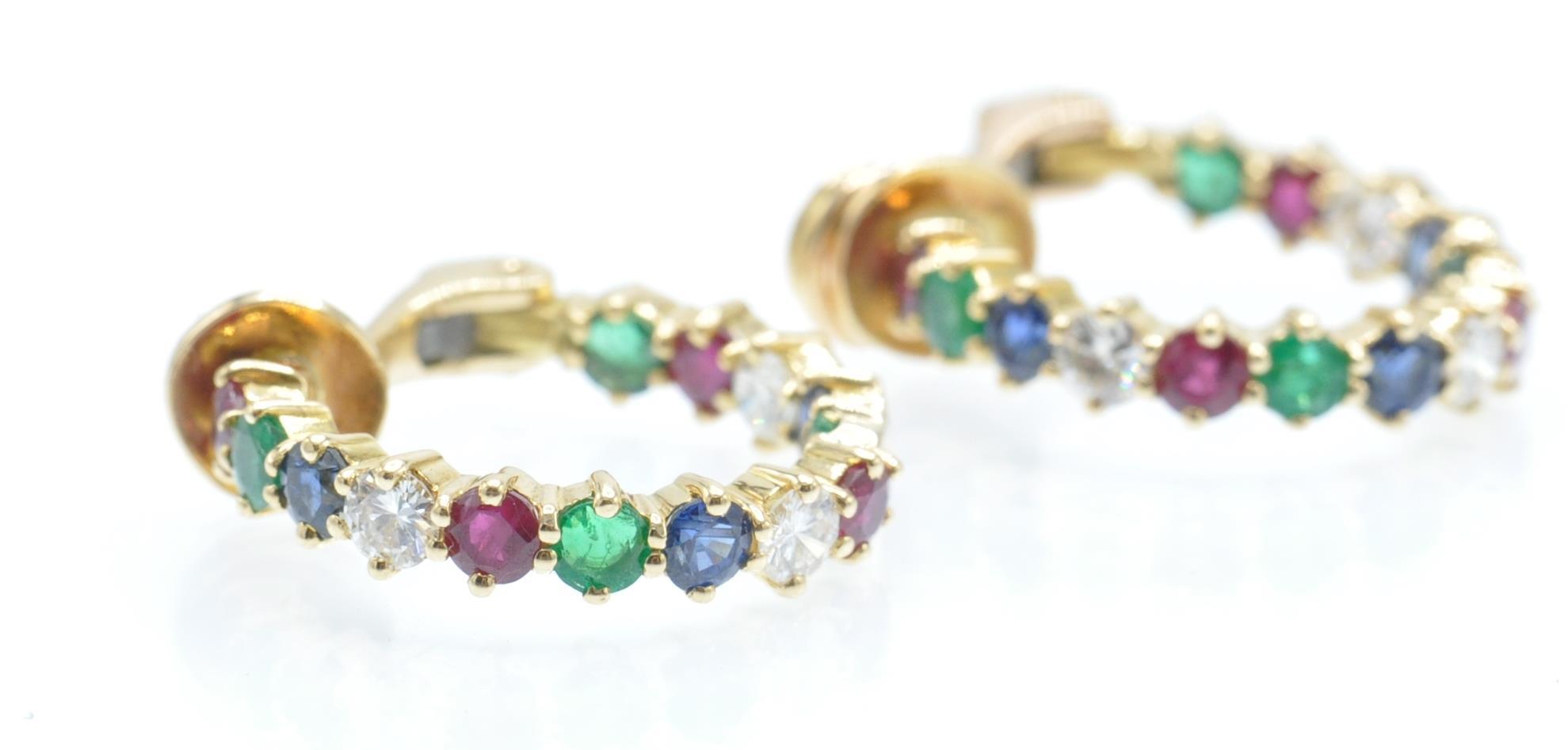 A pair of 18ct gold diamond, sapphire,  ruby and emerald earrings. The earrings with set with - Image 2 of 6