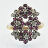An 18ct Gold Ruby & Diamond Fancy Cluster Ring
