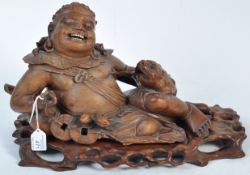 LARGE 19TH CENTURY CHINESE CARVED RECLINED LIU HAI FIGURE