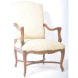 19TH CENTURY FRENCH WALNUT CAROLEAN FIRESIDE OPEN ARMCHAIR