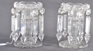 A MATCHING PAIR OF VICTORIAN ANTIQUE CUT GLASS TABLE LUSTRES