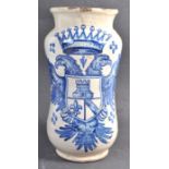 A GEORGIAN ITALIAN ANTIQUE MAIOLICA ALBARELLO VASE BEARING A DOUBLE HEADED EAGLE