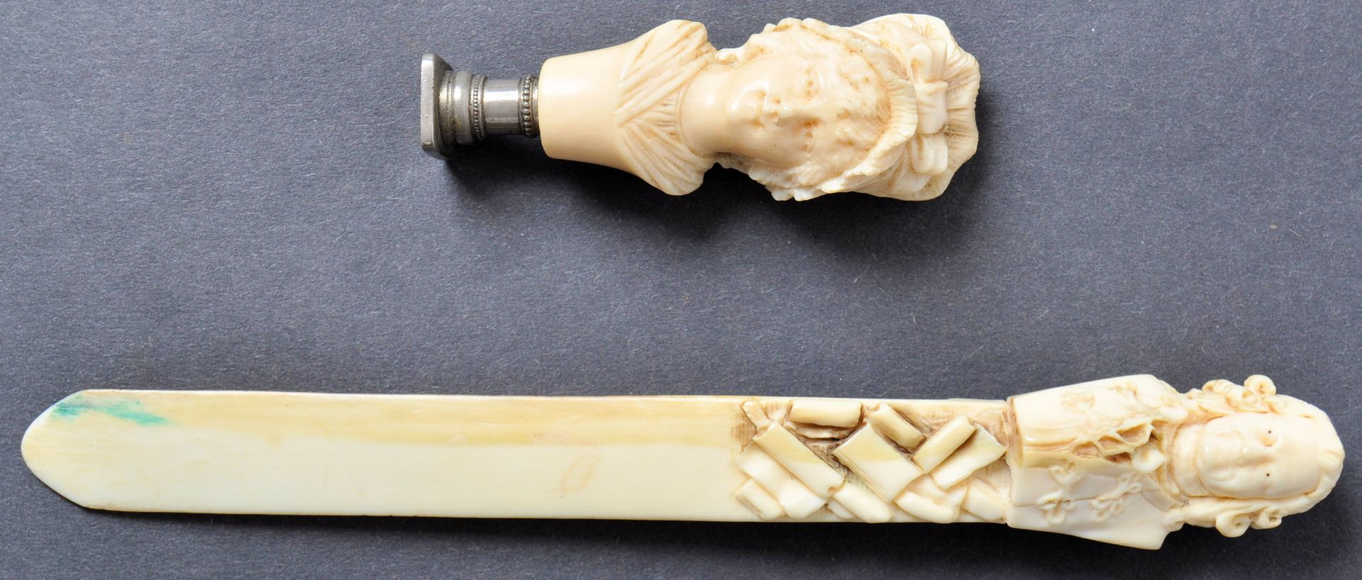 ANTIQUE 19TH CENTURY IVORY CARVED SEAL AND PAGE TURNER IN THE FORM OF HISTORICAL FIGURES