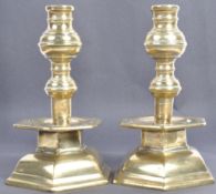 A PAIR OF 18TH CENTURY GEORGIAN ENGLISH HEAVY BRASS CANDLESTICKS