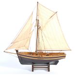 ANTIQUE HAND BUILT MODEL BOAT ON STAND