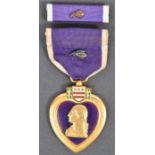 A USA ARMED FORCES ' PURPLE HEART ' FOR MILITARY MERIT MEDAL