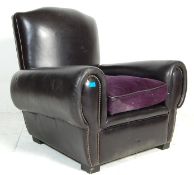 A good early 20th century black leather French clu