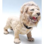 A vintage mid-century retro nodding head lion with