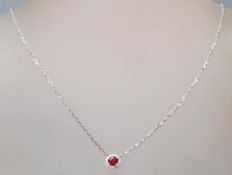 A 18ct white gold pendant necklace, the pendant ha