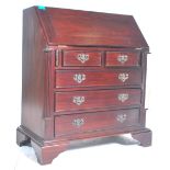 A 20th Century Georgian revival mahogany bureau wi