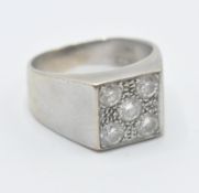 An 18ct white gold and diamond ring having a squar