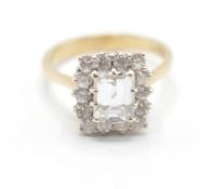 A 9ct gold and white stone cluster ring having a c