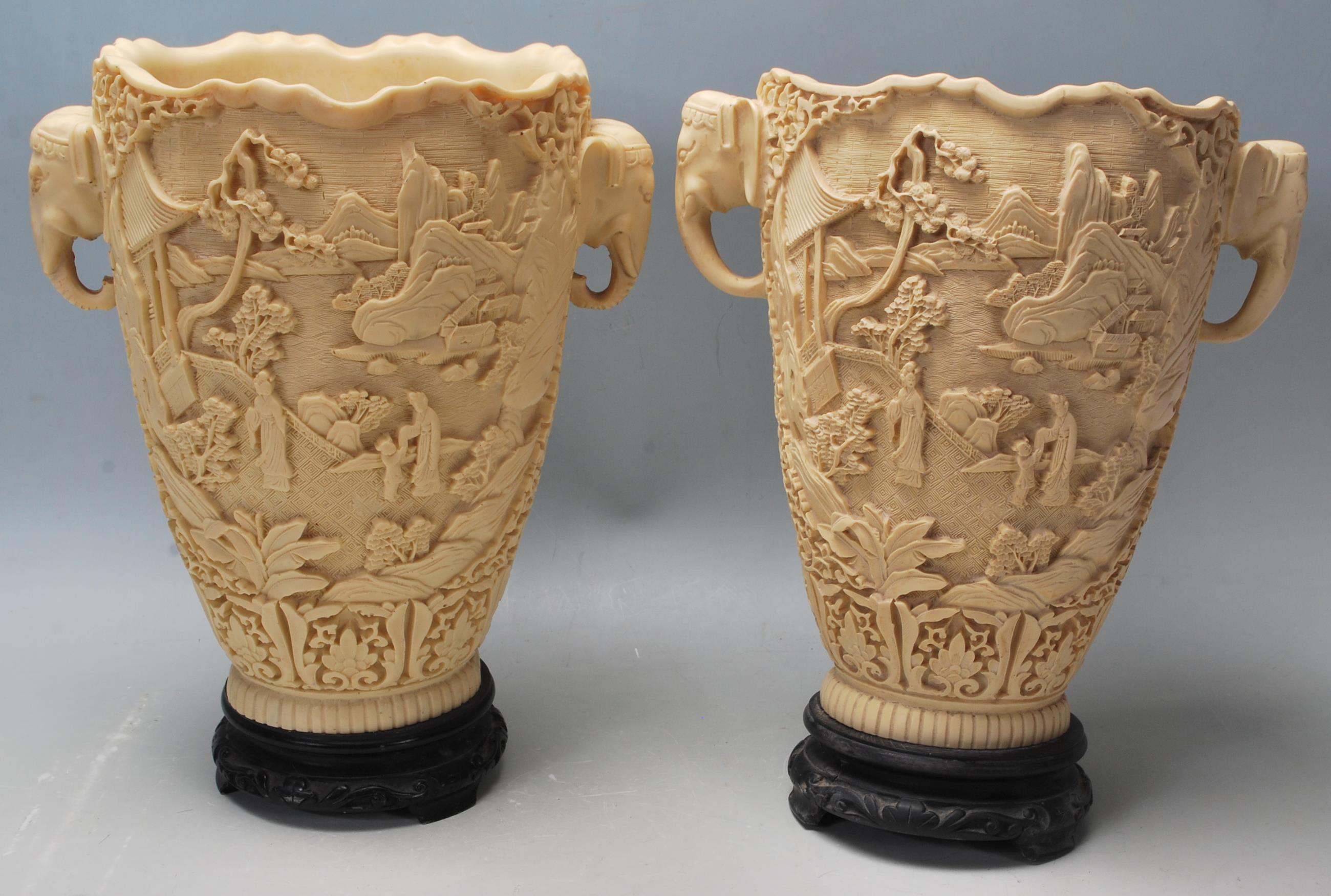 A pair of early 20th Century Chinese resin vases h