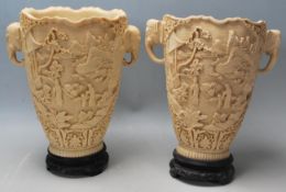 A pair of early 20th Century Chinese resin vases h