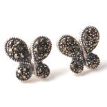 A pair of silver and marcasite earrings in the for