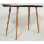A vintage 20th century 1970’s low coffee table with marble effect top, gold colourway edge band