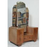 A good early 20th century art deco walnut dressing table. The dressing table having three bevelled