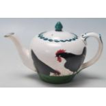 A RARE 20TH CENTURY BRISTOL POTTERY CERAMIC TEAPOT AND CREMER