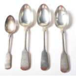 A group of four 19th Century Victorian spoons in the fiddle pattern each having engraved initials to