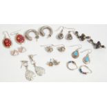 A collection of vintage ladies silver earrings to include a pair of stud back hoop earrings, a