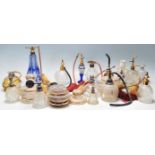 A collection of late early 20th Century Art Deco style perfume bottles of various shapes and