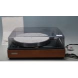 A vintage Leak truspeed transcription turntable / record player with teak wood case and transport