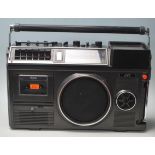 A vintage retro 20th century portable JVC 3080UKC radio tv cassette recorder 3-in-1 with multiple