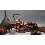 A collection of antique copper wares to include a Victorian kettle, watering can, trivet stand,