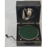 An early 20th Century portable / table top Decca gramophone having a black leatherette case  with