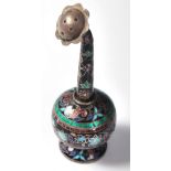 A 20th Century silver white metal pepperette having enamelled cloisonne throughout with decoration