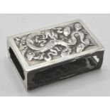 A good 20th century continental silver hallmarked matchbox holder having dragon decoration to one