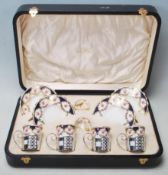 A cased 1930's 20th century silver hallmarked and porcelain coffee / tea service. The Imari / chintz