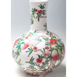 A 20th Century Chinese republic period bottle vase having a bulbous body and cylindrical neck