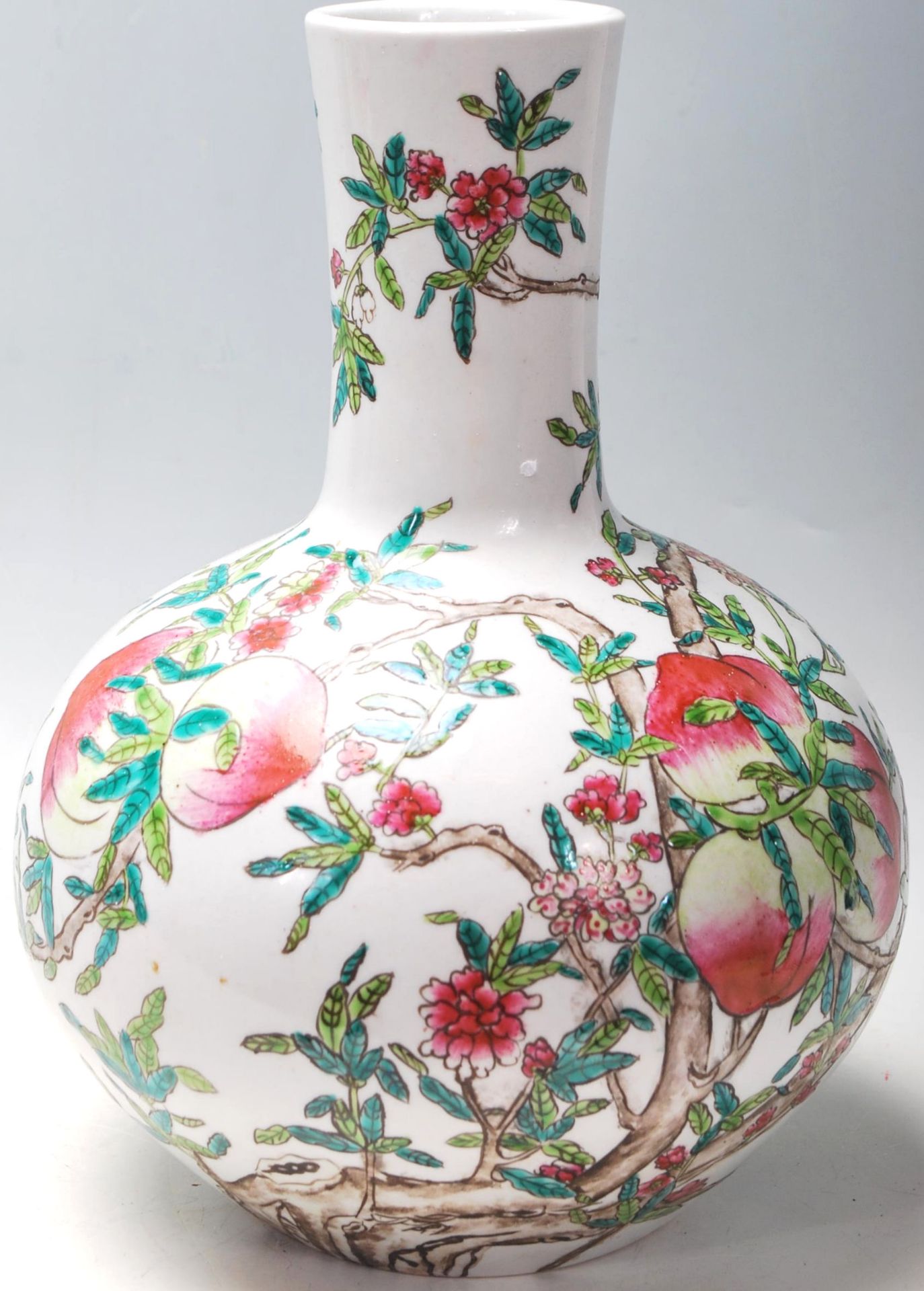 A 20th Century Chinese republic period bottle vase having a bulbous body and cylindrical neck