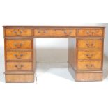 A good quality antique Georgian style walnut  twin pedestal desk with matching 2 drawer leather