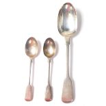 A group of three 19th Century Victorian silver spoons in the fiddle pattern to include a large spoon
