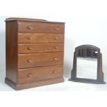 A 20th century Ercol style elm  chest of drawers by Jentique. The chest with an upright bank of