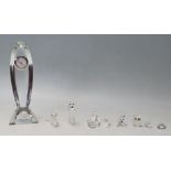 A collection of Swarovski cut crystal animal ornaments to include a fox, an owl, a kiwi bird, a