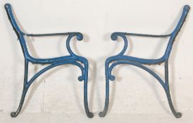 A pair of early 20th Century antique art nouveau style cast iron scroll work garden bench ends