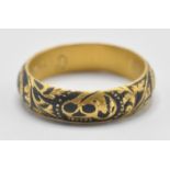 An early 18th Century gold memento mori mourning ring, the band being engraved with a skull and