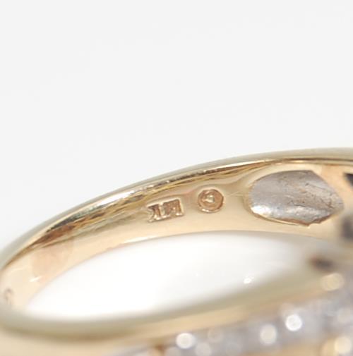 A 14 ct gold and diamond ladies ring having a central marquise cut diamond with further round and - Image 6 of 7
