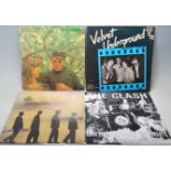 A collection of four vintage vinyl LP Long play records to include Echo and The Bunnymen - Songs
