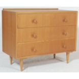 A vintage 20th century 1970’s teak wood Meredew chest of drawers having three full-size drawers with