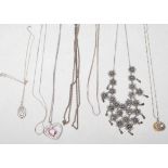 A group of vintage silver necklaces to include a collar necklace with rope twist florals set with