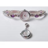 A ladies Gianni Vecci silver bracelet watch having a round case with a mother of pearl face and