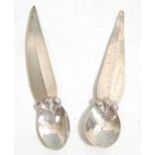 A pair of silver spoons with hammered bowls and unusual tapered handles. Weight 20g
