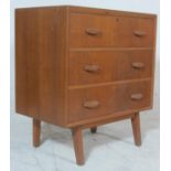 Gplan - Ernest Gomme. A retro vintage light oak chest of drawers having 3 drawers with shaped